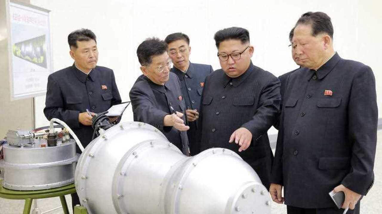 File photo of North Korean leader Kim Jong-un, second from right, at an undisclosed location