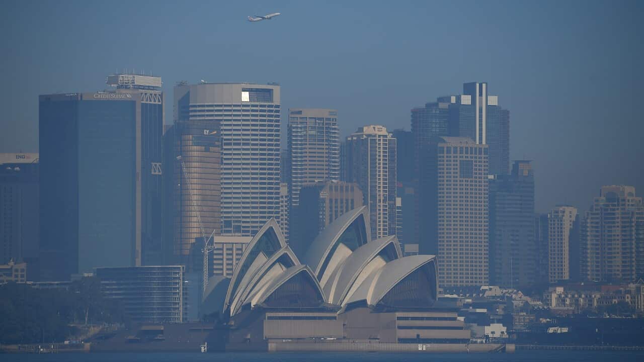 Smoke is seen blanketing the Sydney city skyline as a result of Rural Fire Service hazard reduction burns.