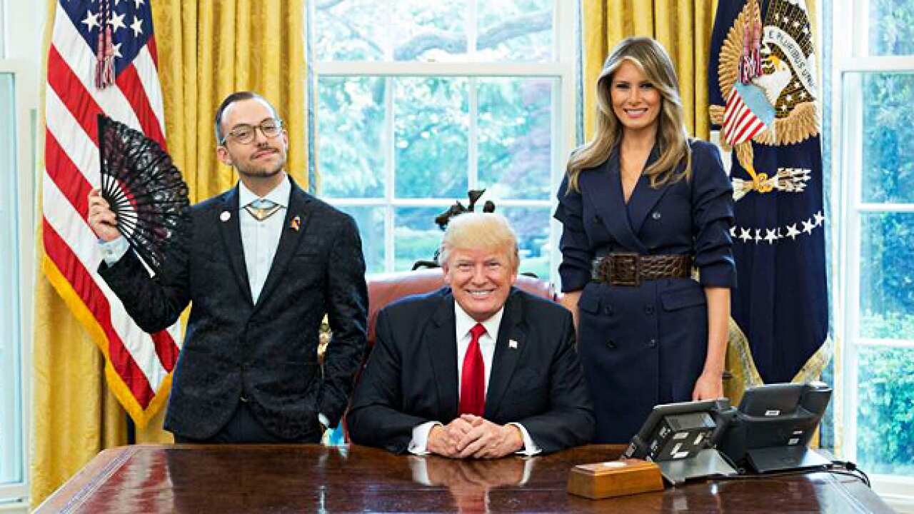 Nikos Giannopoulos at the White House, with President Donald Trump and First Lady Melania Trump.