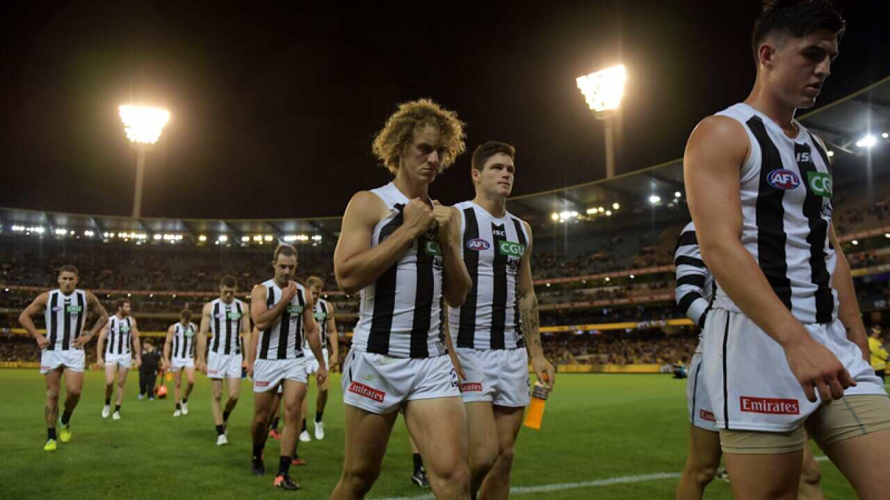 Collingwood players walk off