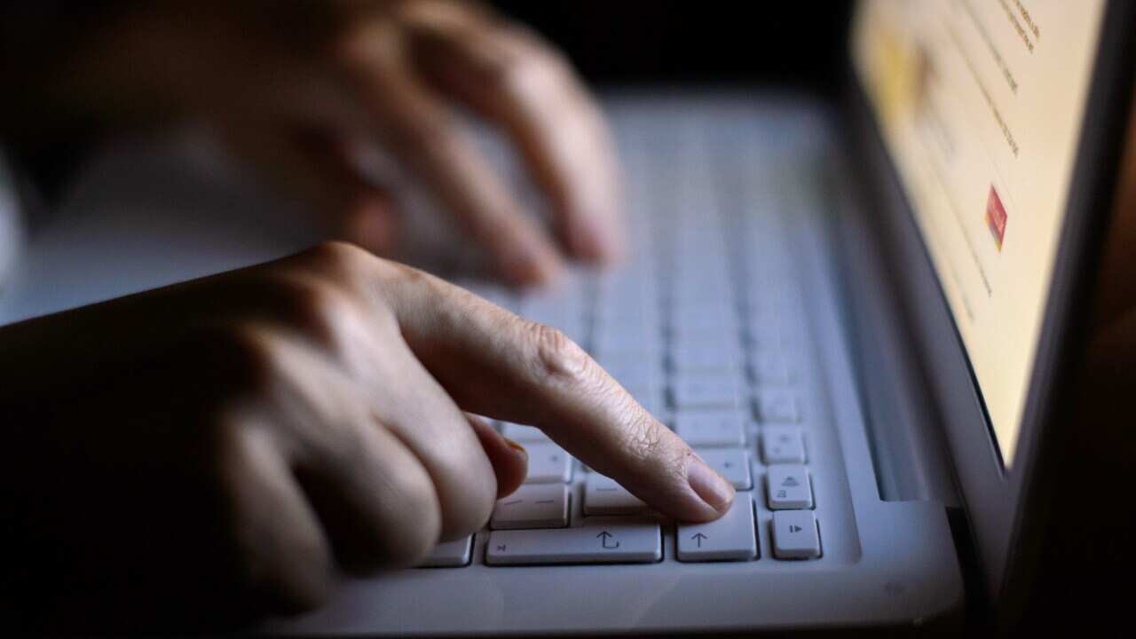 File photo dated 06/08/13 of a person using a laptop. Football fans have been urged to strengthen their cyber security settings as millions prepare to log-in to subscription services to watch the return of the Premier League.. Issue date: Wednesday June 1