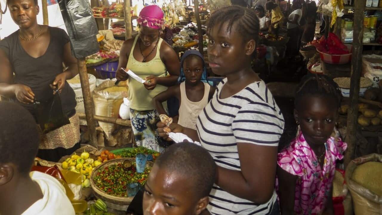 a_woman_from_sierra_leone_shops_with_her_children_-_aap-001.jpg
