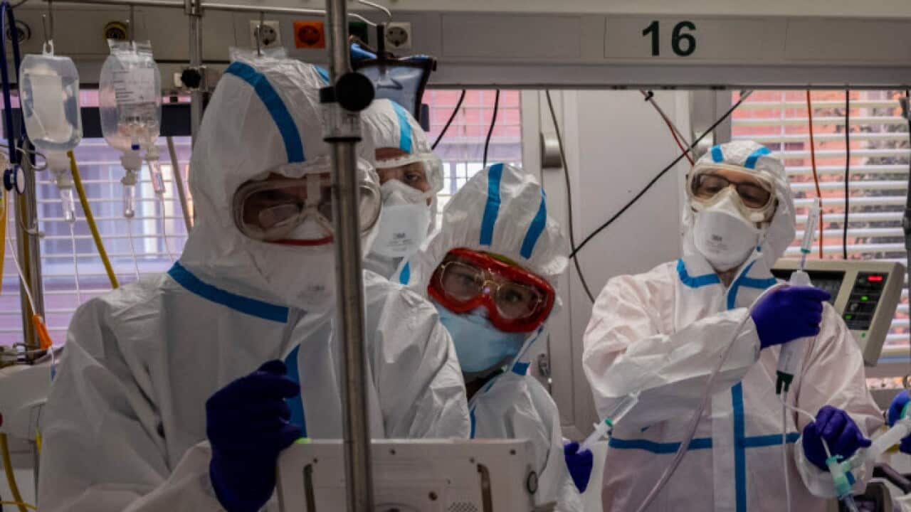 A patient infected with COVID-19 is treated in one of the intensive care units (ICU) at the Severo Ochoa hospital in Leganes, outskirts of Madrid, Spain.