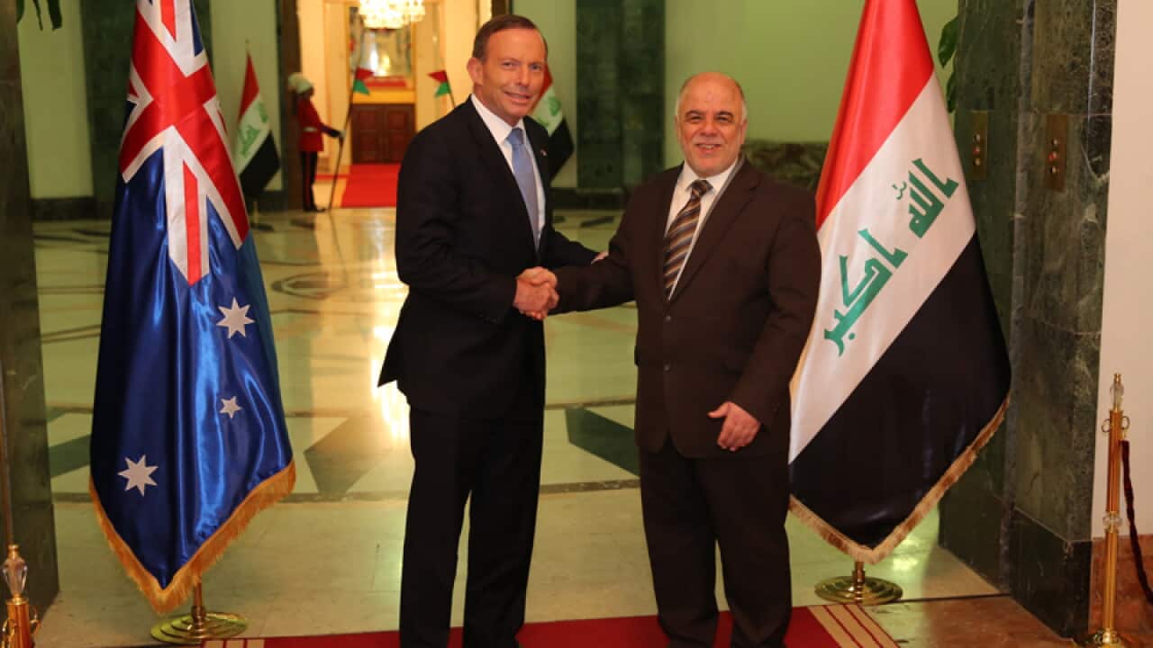 PM Tony Abbott (left) meets Iraqi PM Haider Al- Abadi in Baghdad