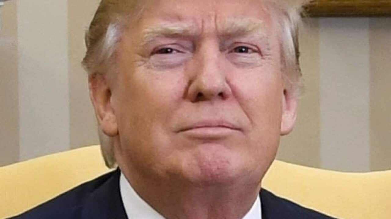 U.S. President Donald Trump, seen in this undated file photo, said March 5, 2018, that he is "not backing down" from a controversial plan to impose tariffs on imports of steel and aluminum which he announced the previous week. (Kyodo)==Kyodo