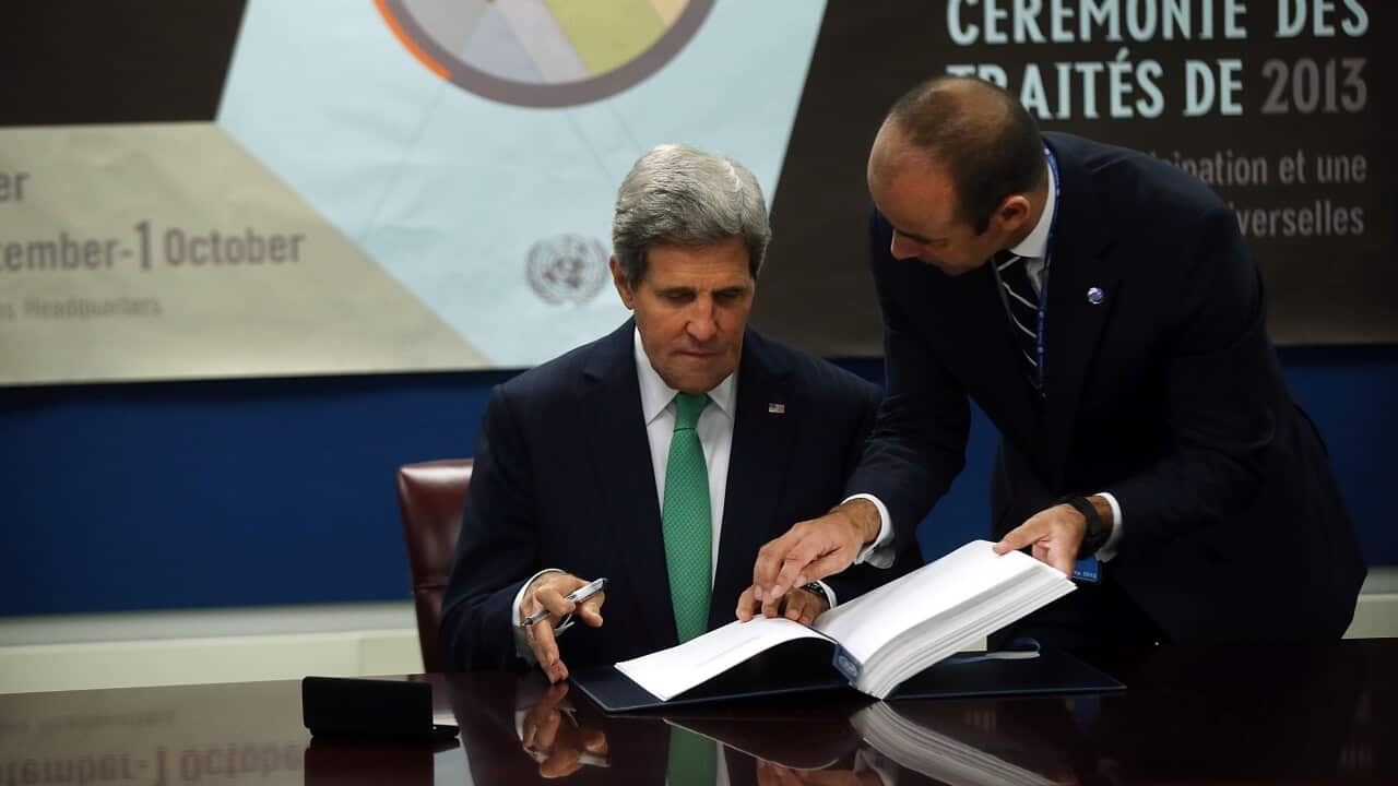U.S. Secretary of State John Kerry signs the U.N. Arms Trade Treaty - Getty.jpg