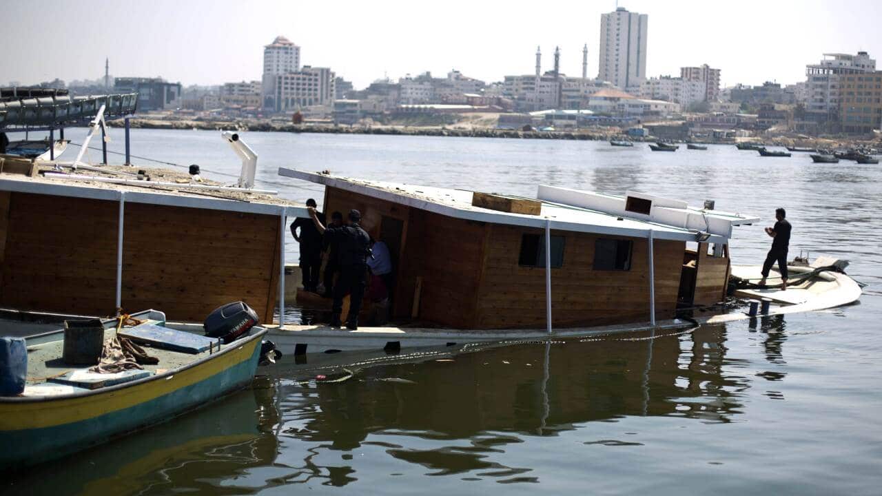 Palestinian Hamas policemen inspect the Gaza's Ark - AAP-1.jpg