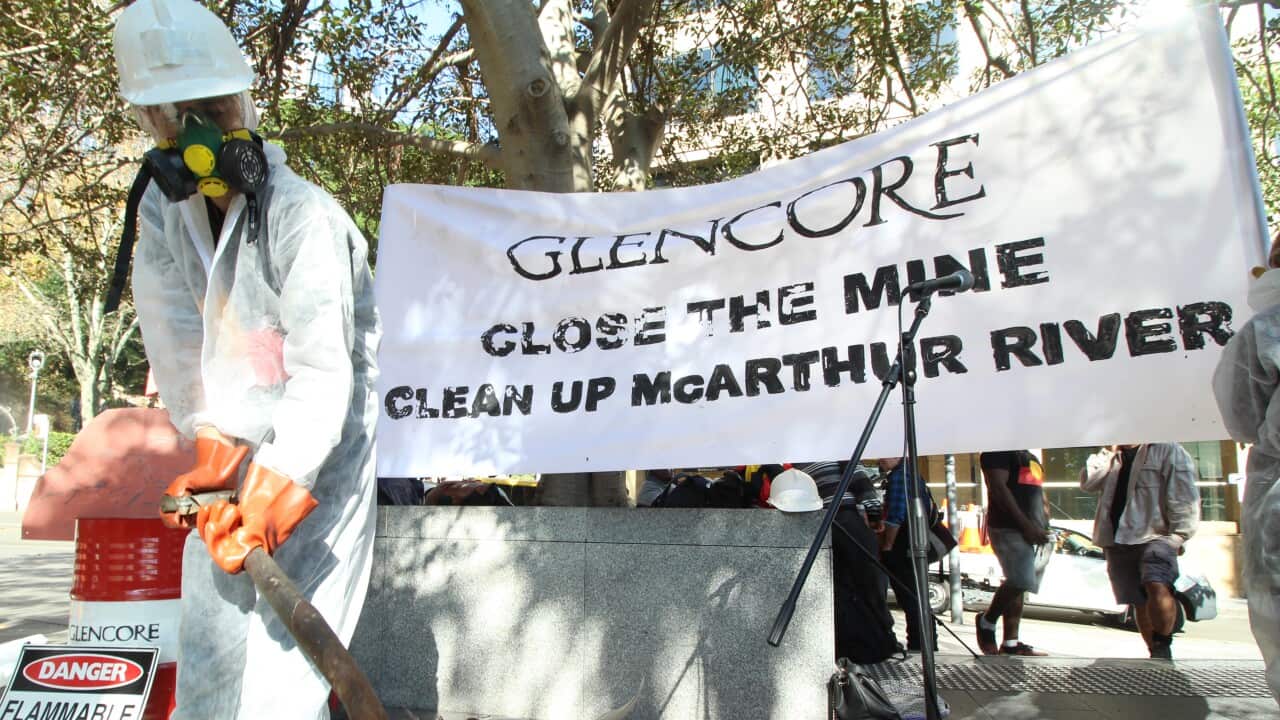 Representatives of the Northern Territory's Borroloola Indigenous clan groups are among scores of protesters in Sydney to demand miner Glencore close and clean up its McArthur River site in the Top End, May 2016.