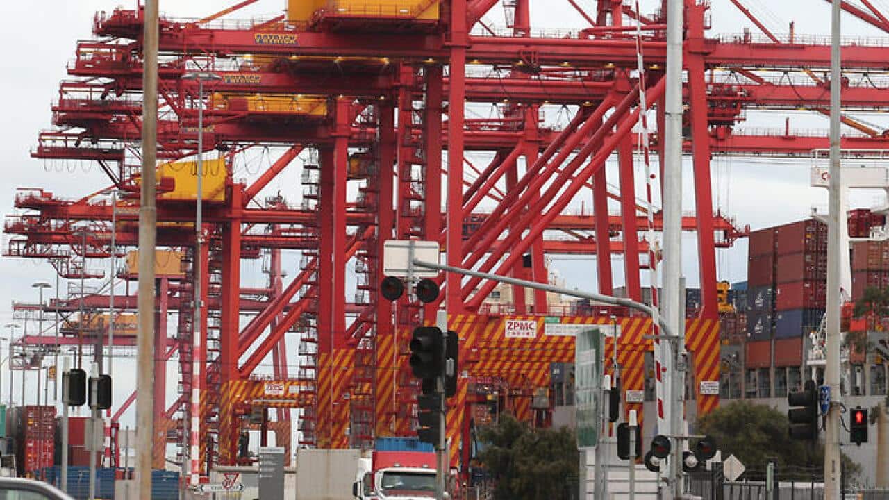 Cranes wait to load containers at the Port of Melbourne in Melbourne, Wednesday, Aug 6, 2014. (AAP Image/David Crosling) NO ARCHIVING