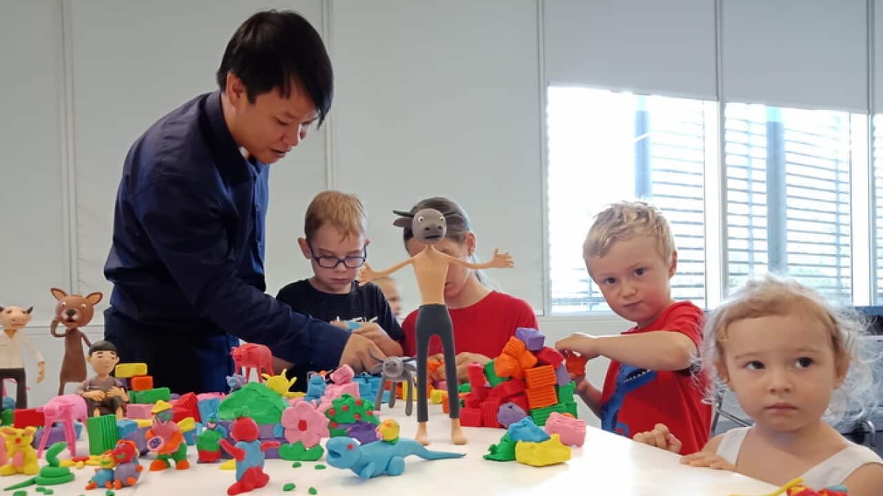 Souliya Phoumivong leads a claymation workshop at Queensland's Gallery of Modern Art