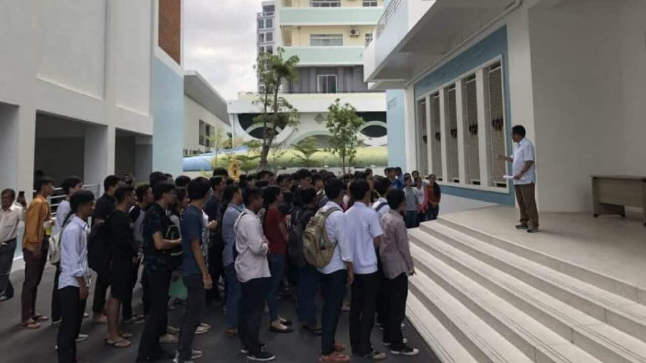 High school students in Cambodia complaint about their exam results.