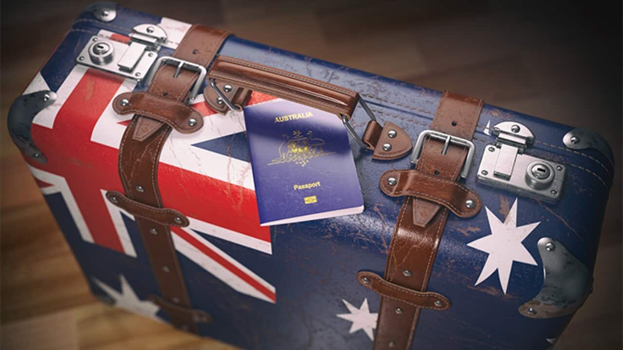 Passport of Australia and suitcase with flag of Australia