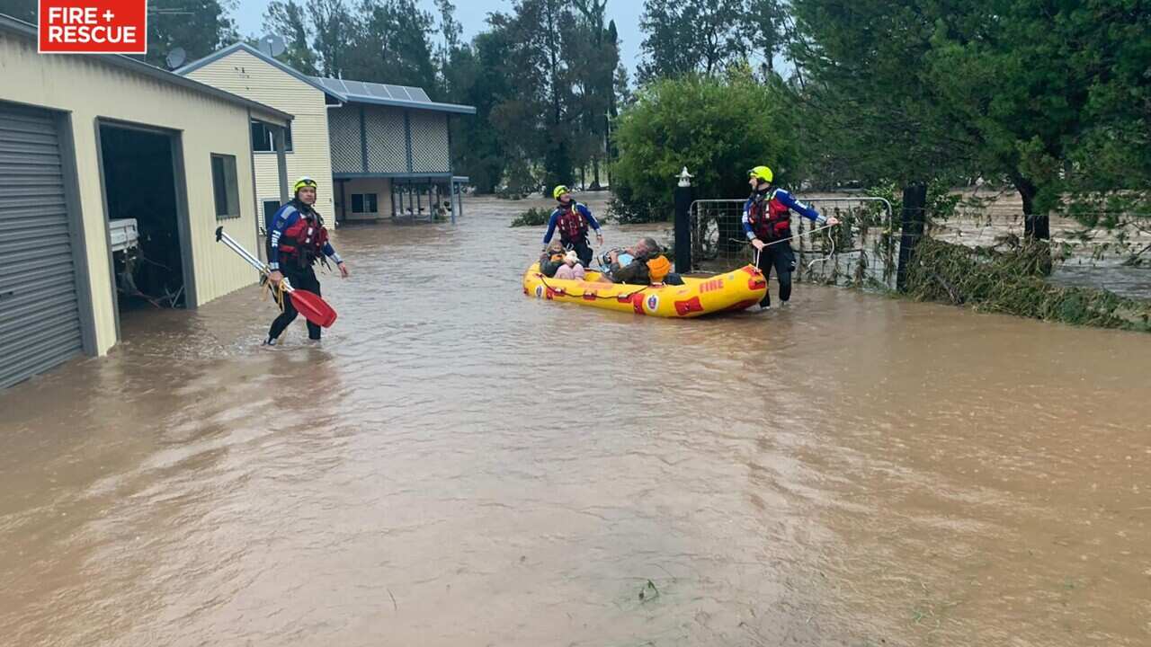A supplied image obtained on Monday, March 22, 2021, of NSW Fire and Rescue teams are seen assisting during the NSW floods.