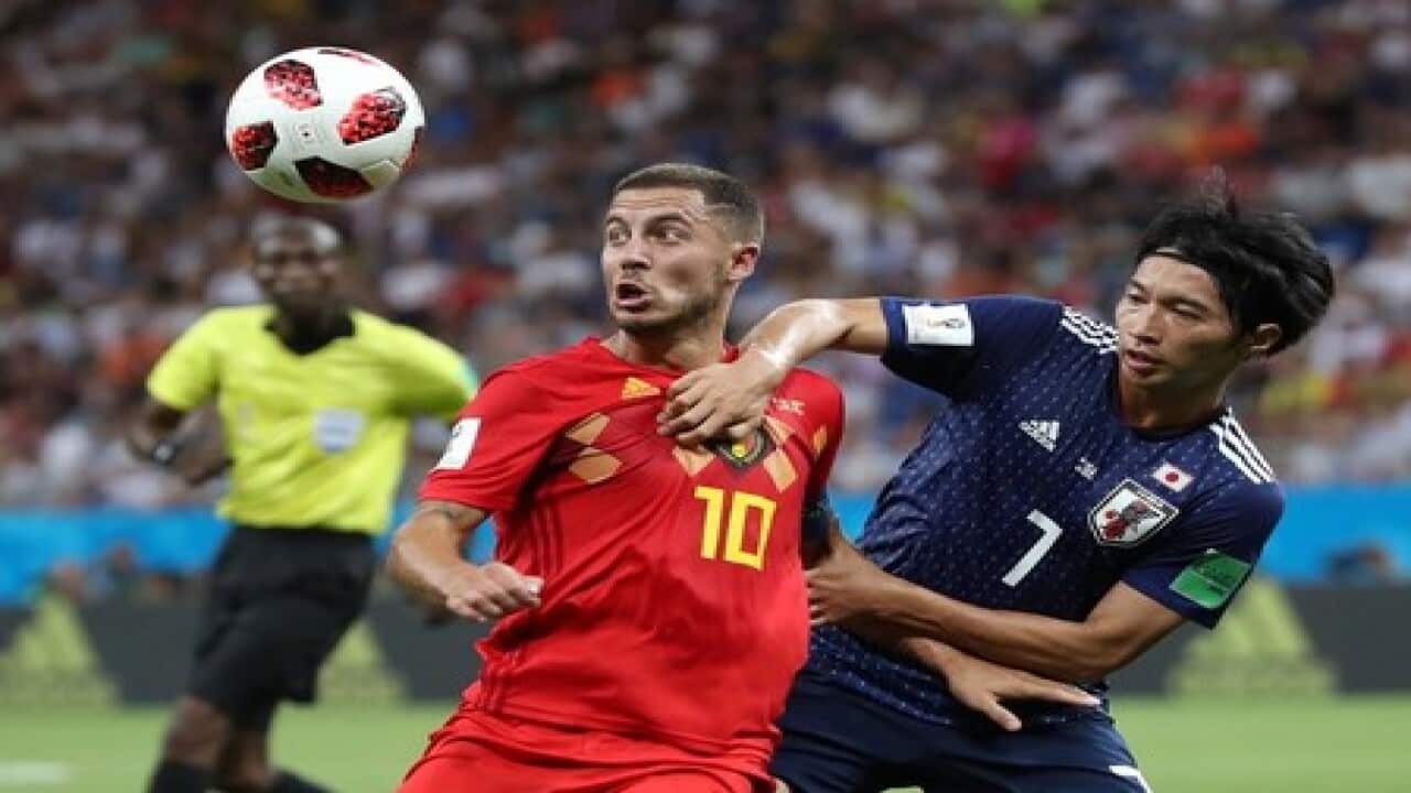 Soccer-Japan holding Belgium 0-0 at halftime