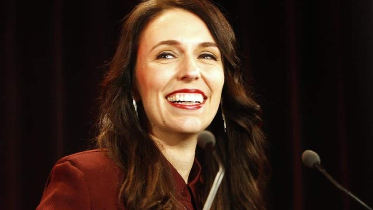 New Zealand Prime Minister Jacinda Ardern talks to supporters.