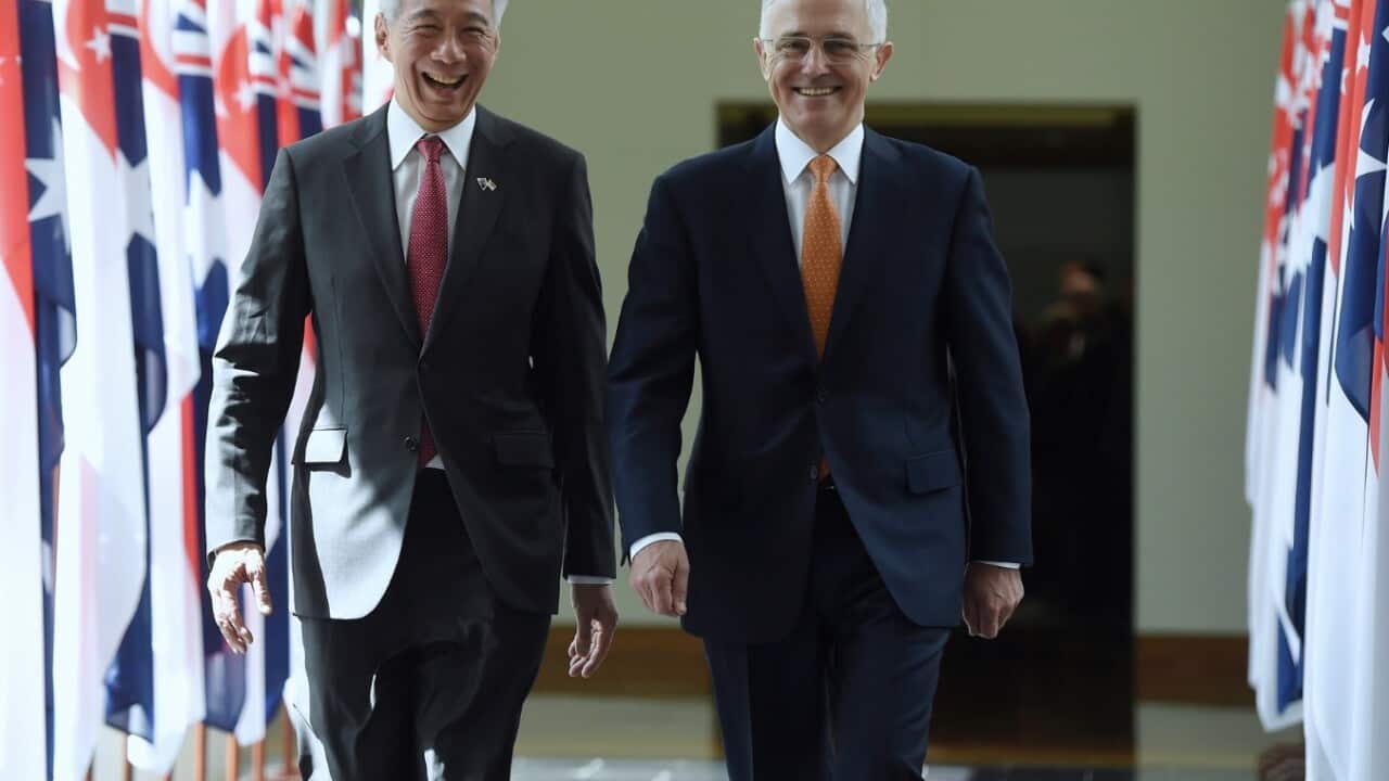  Prime Minister of Singapore Lee Hsien Loong (left) and Australian Prime Minister Malcolm Turnbull leave the House of Representatives 