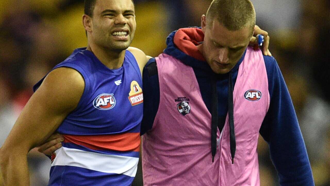 Jason Johannisen (left) of the Bulldogs