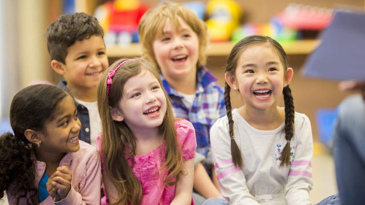 Children Listening to a Story