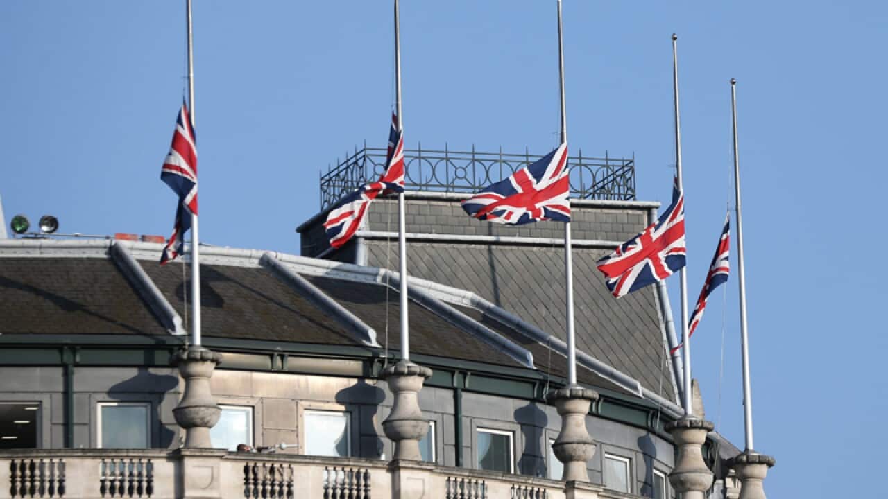 Flags at half mast over Trafalgar Square in London