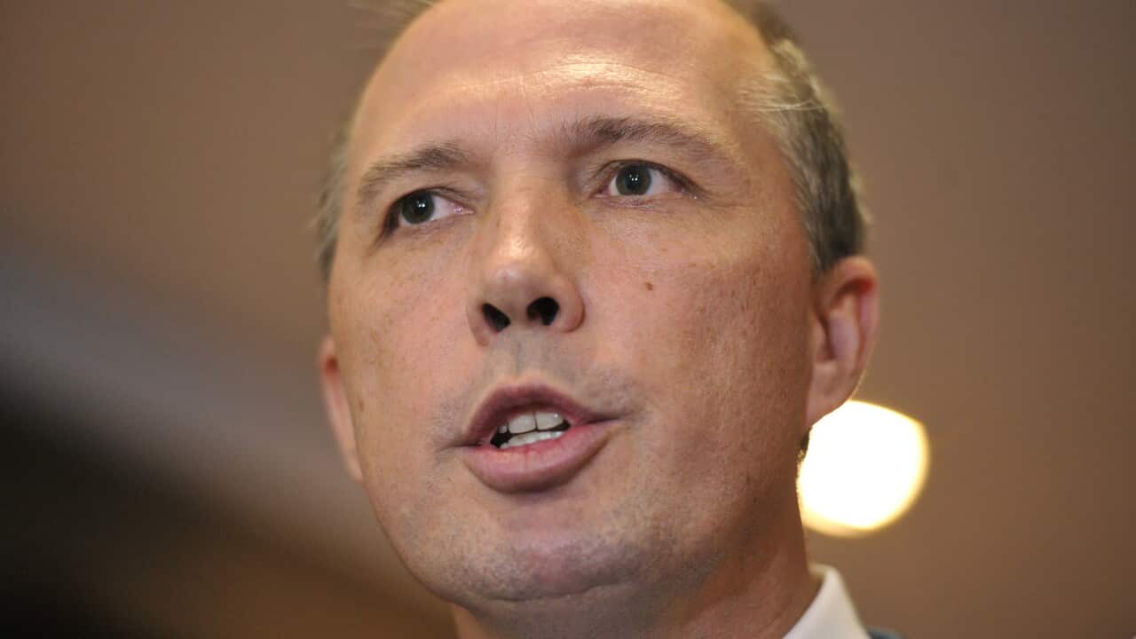 Minister for Immigration Peter Dutton speaks to the media in Sydney, Friday, April 29, 2016. (AAP Image/Joel Carrett) NO ARCHIVING