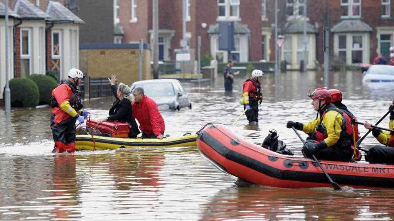 Fire and Rescue teams continue their work to bring people out of flooded homes in Carlisle.