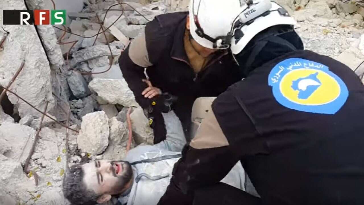 White helmets participate in the Mannequin Challenge.