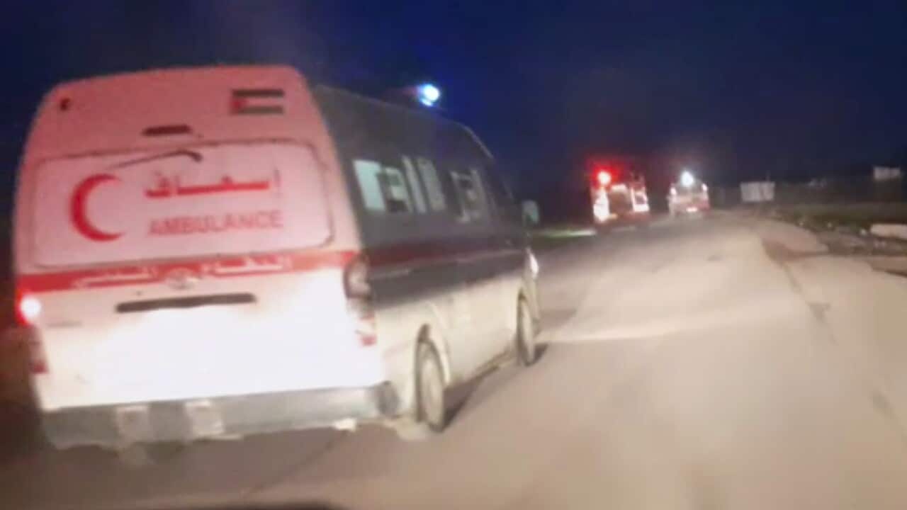 This frame grab from a video released by the Palestinian Red Crescent Society, taken with a phone by one of the 15 Palestinians medics killed, shows Red Crescent emergency vehicles, their lights and sirens flashing and their logos clearly visible, seconds before they came under a barrage of gunfire from Israeli army soldiers in Tel al-Sultan, a district of the southern Gaza Strip town of Rafah, early Sunday, March 23, 2025.