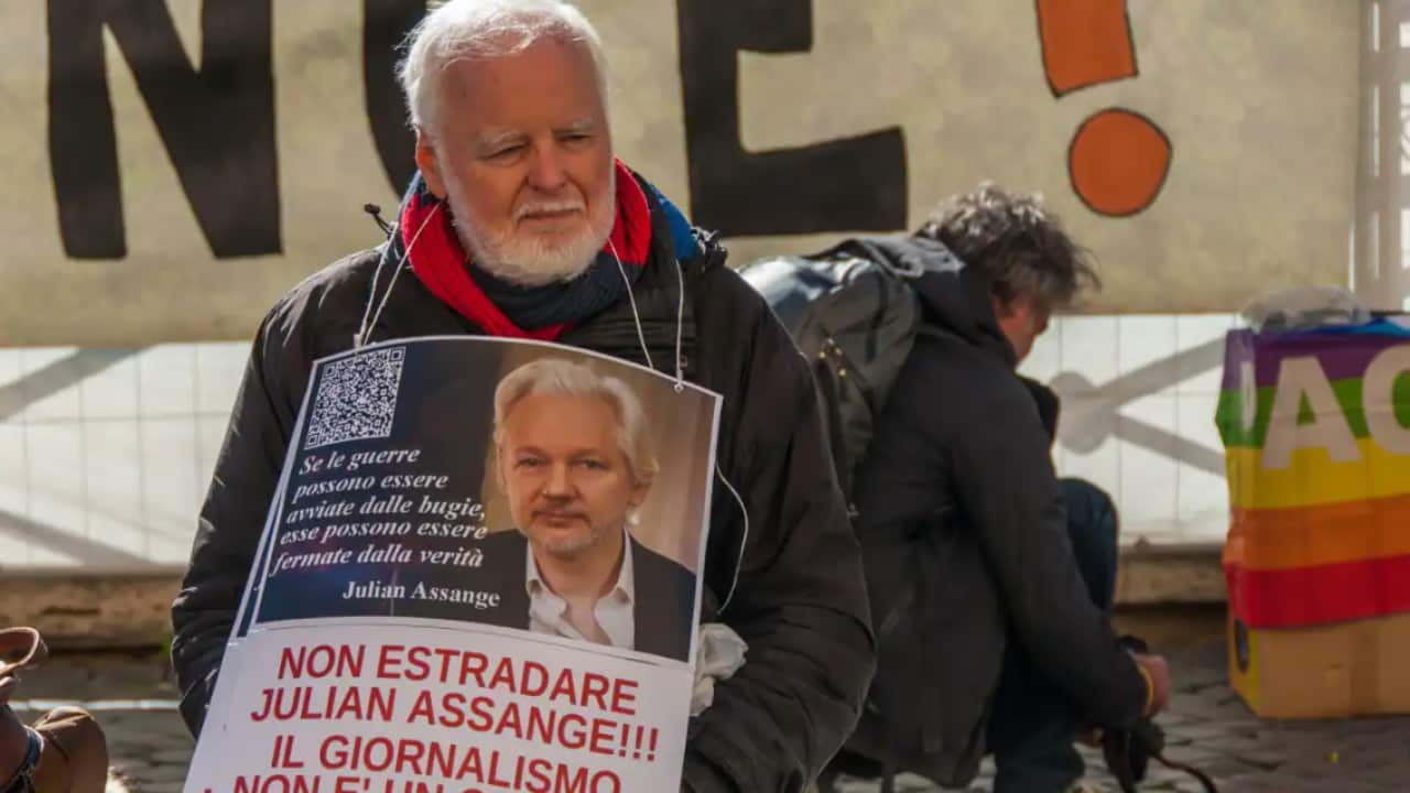 Activists in favour of the release of Julian Assange, detained in the United Kingdom for extradition to the United States, on 11 April, 2022.