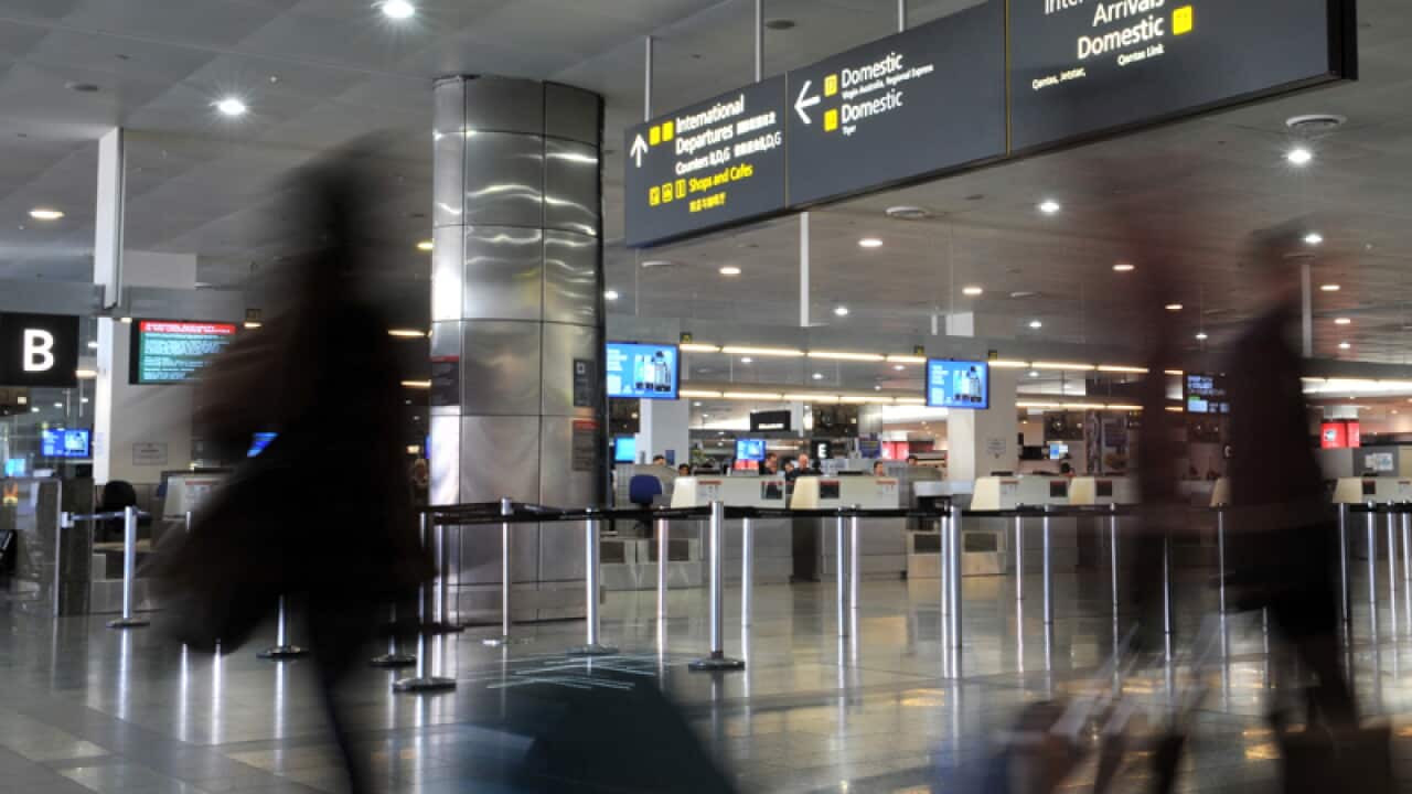 Travellers at Melbourne Airport