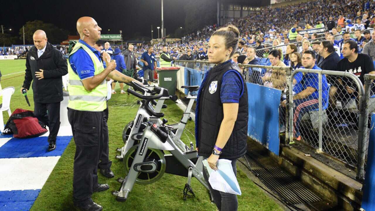Security stand next the bikes where a bottle was thrown