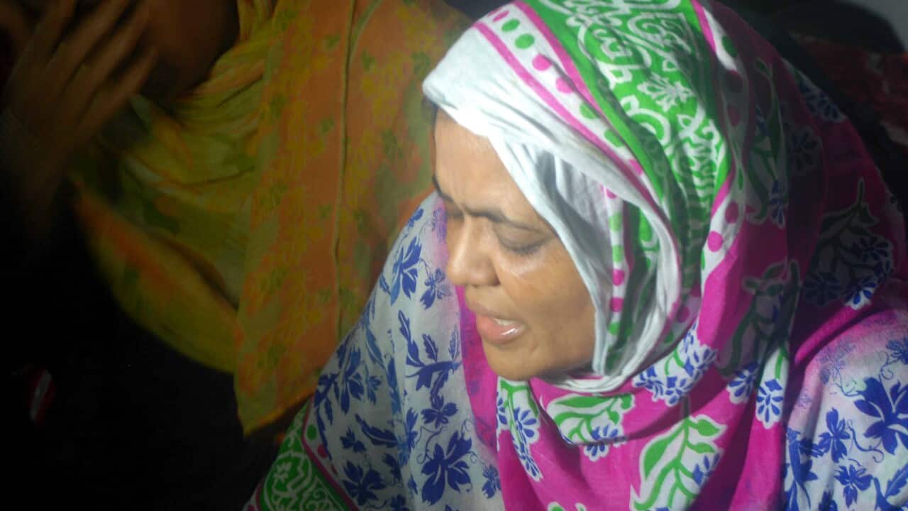 The sister of slain Rajshahi University professor Rezaul Karim Siddiquee mourns after hearing news of his death at Salbagan, Rajshahi in Bangladesh