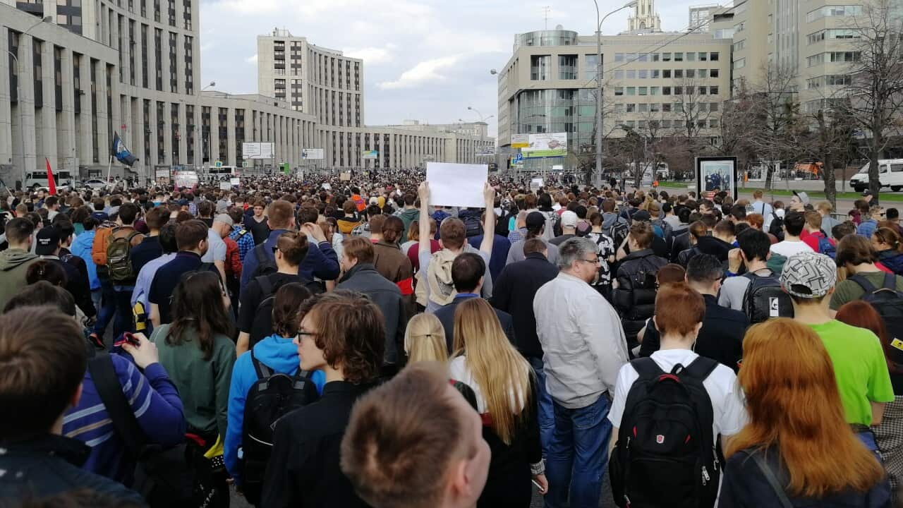 Thousands take part in an opposition rally in central Moscow.