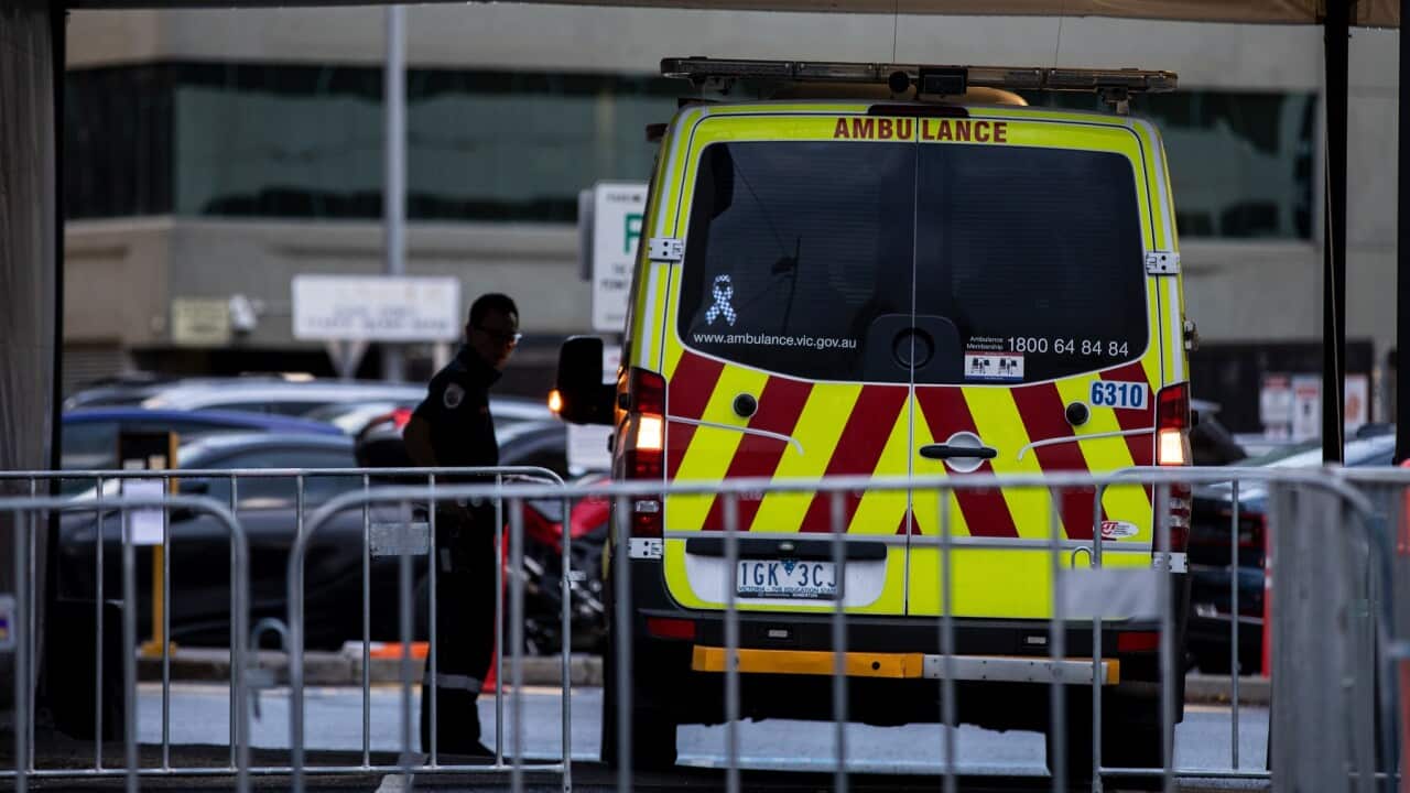 A ambulance is parked at the Alfred Hospital in Melbourne, Thursday, June 9, 2022. (AAP Image/Diego Fedele) NO ARCHIVING