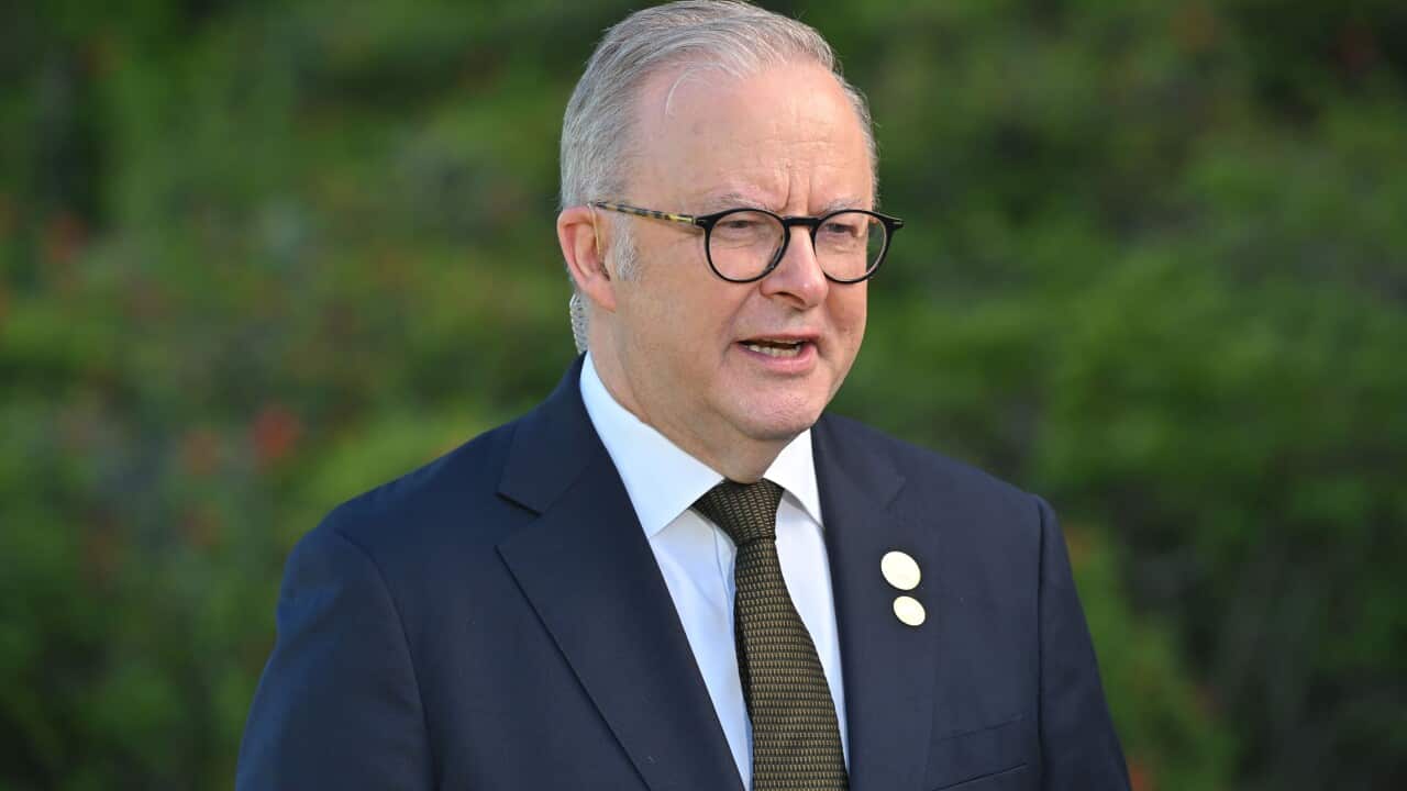 Prime Minister Anthony Albanese, wearing a suit and tie, is speaking.