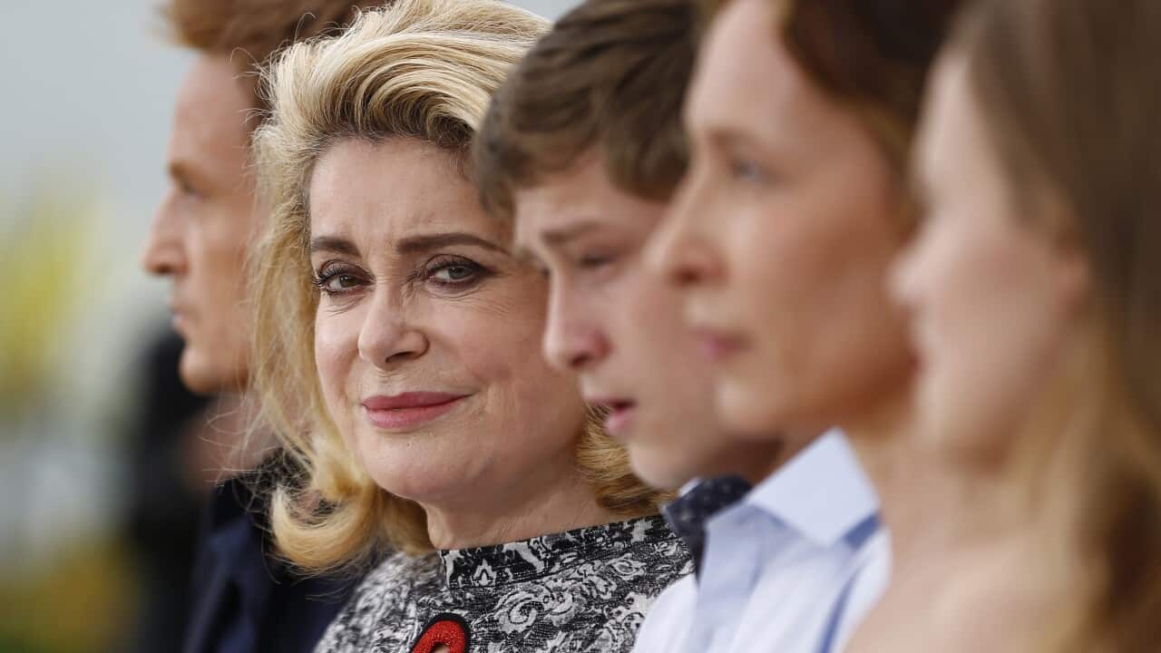 French actress Catherine Deneuve poses during the photocall for 'La Tete Haute' (Standing Tall) at the 68th annual Cannes Film Festival, in Cannes, France