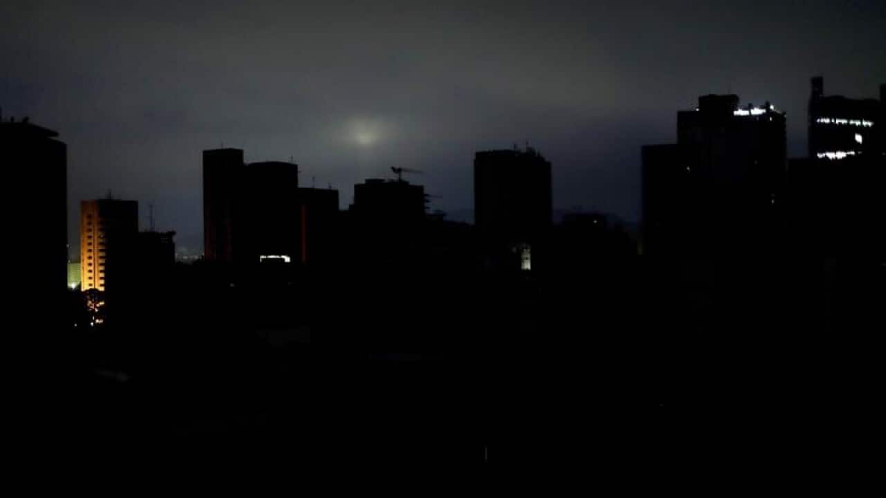 The dark skyline in Caracas at dawn
