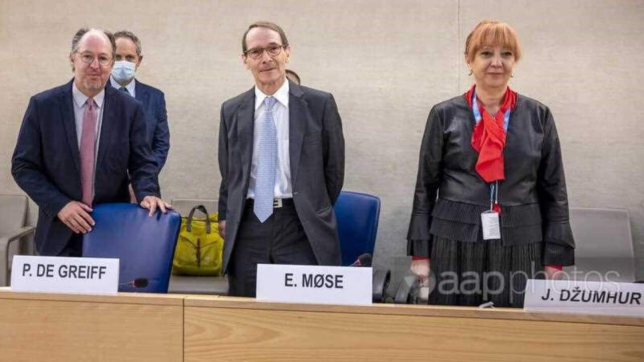 Erik Mose, center, Chairperson of the Independent International Commission of Inquiry on Ukraine, of the other members of the Commission, Pablo de Greiff, left, and Jasminka Dzumhur, right, speaks, during the Human Rights Council special session to addres