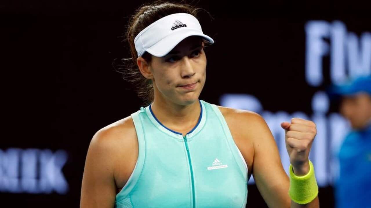 Garbine Muguruza of Spain celebrates winning against Anastasija Sevastova of Latvia at the end of their Women's Singles third round match for the Australian Open tennis tournament, in Melbourne, Australia, 20 January 2017. EPA/LYNN BO BO