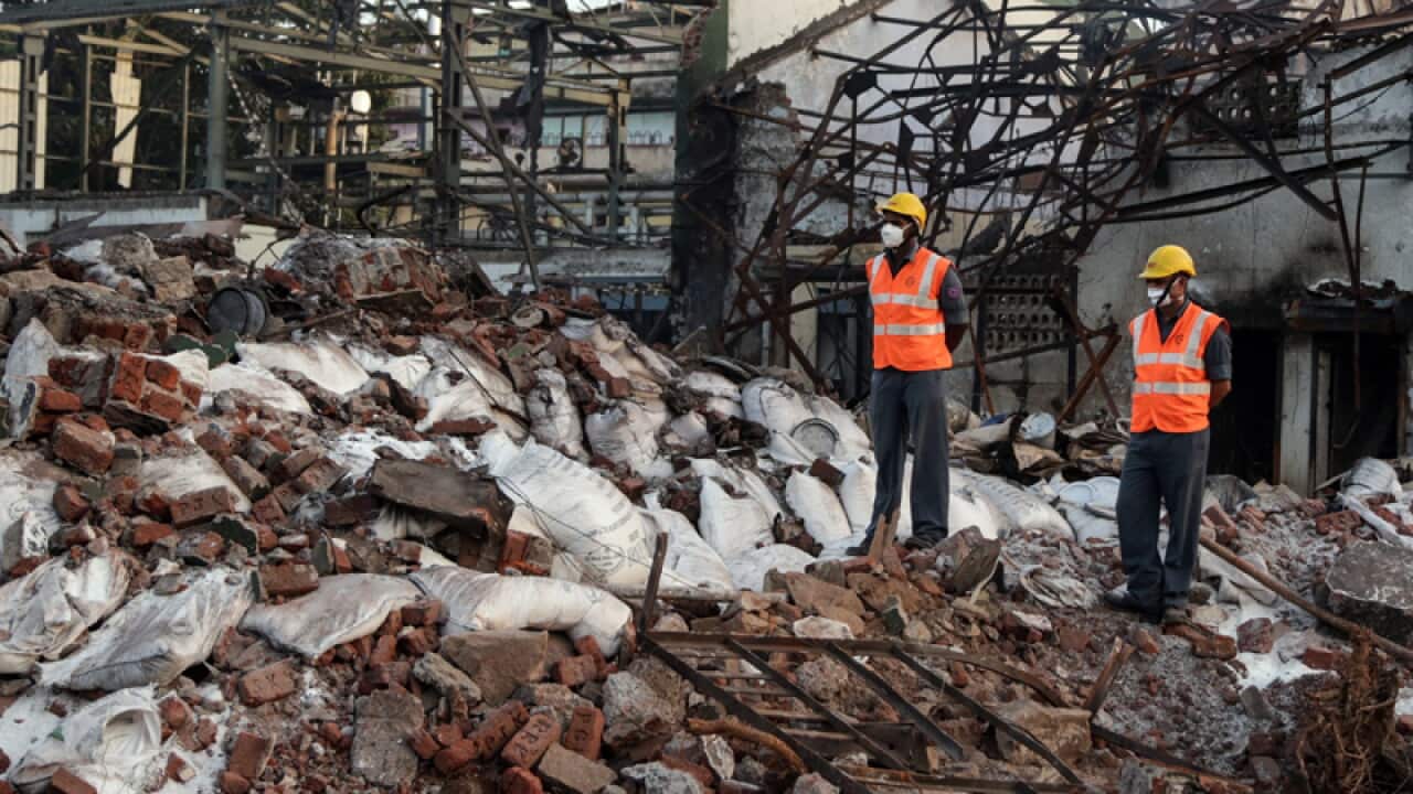 Indian rescue workers after a blast in a chemical factory