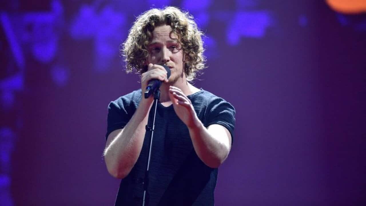 Michael Schulte performs during a photo rehearsal prior to the national selection final for the 63rd annual Eurovision Song Contest (ESC) in Berlin, Germany, 21 February 2018.