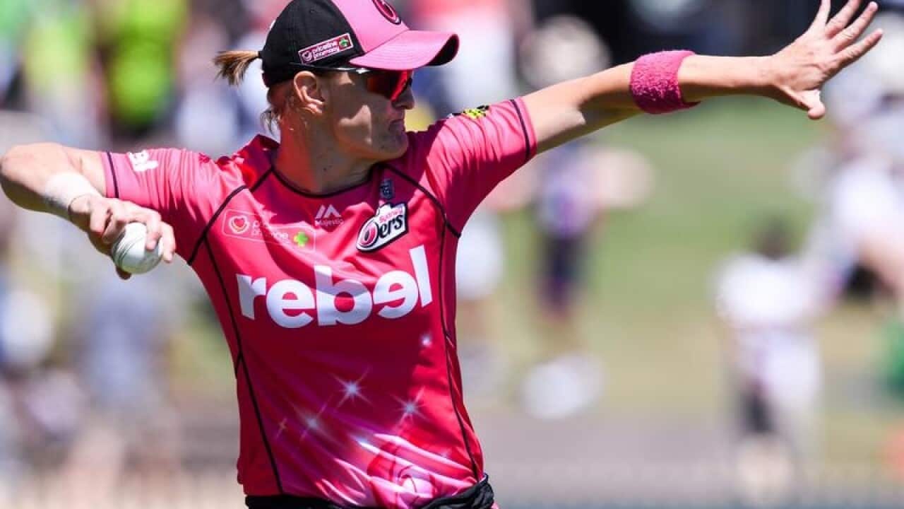 Sarah Aley of the Sixers throws the ball.