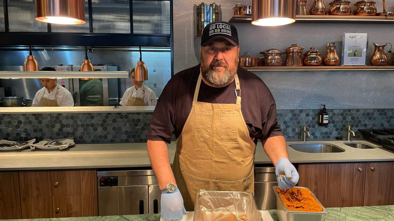 A chef in a kitchen.