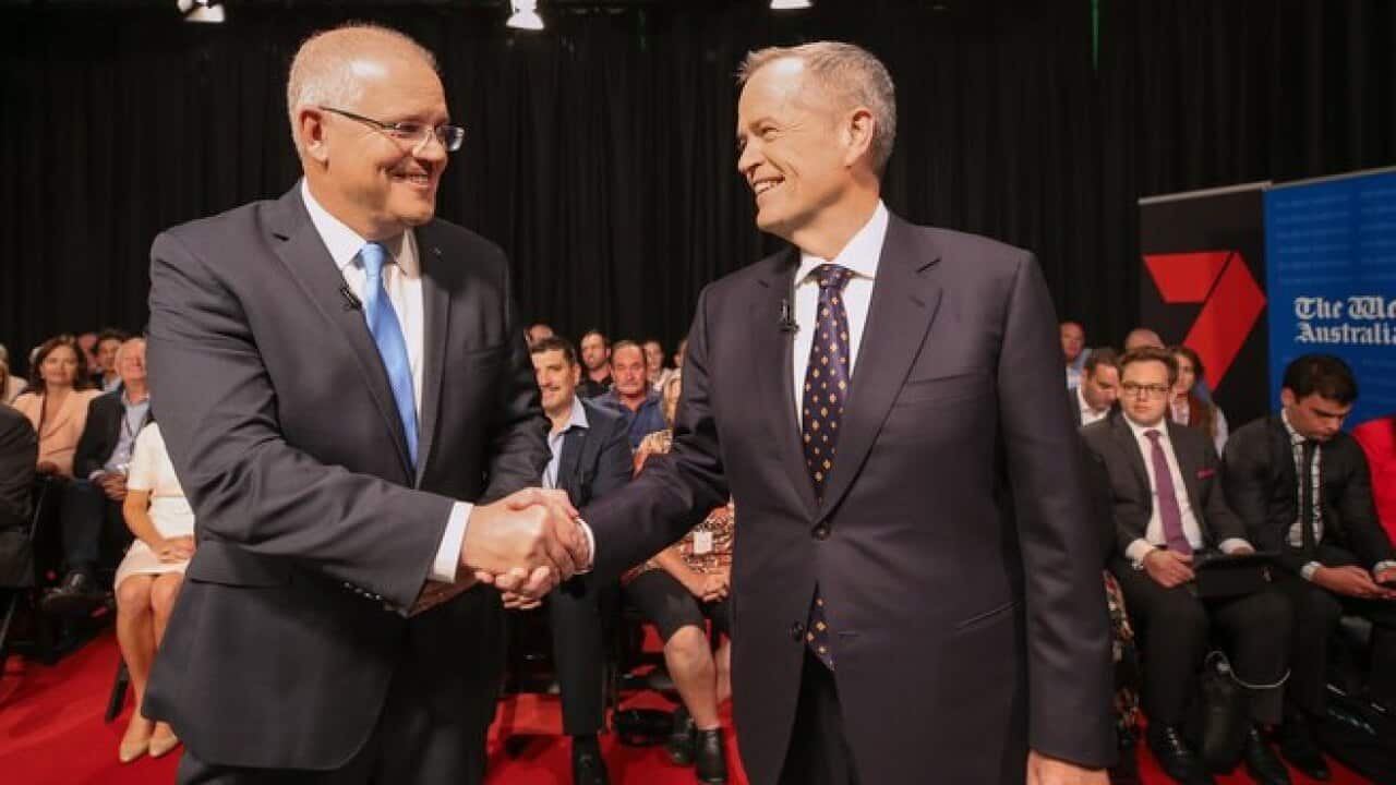 Prime Minister Scott Morrison and Opposition leader Bill Shorten shake hands before the leaders debate. But are debates still relevant?