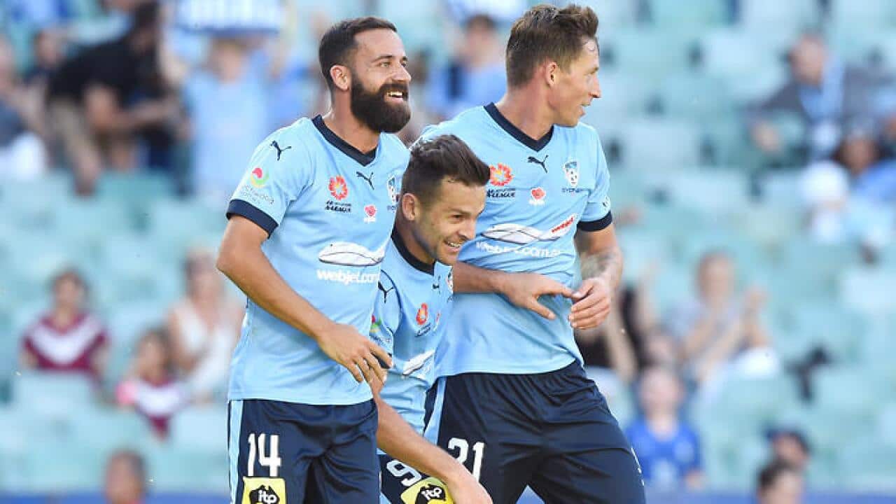 Sydney FC players celebrate their win over Perth Glory