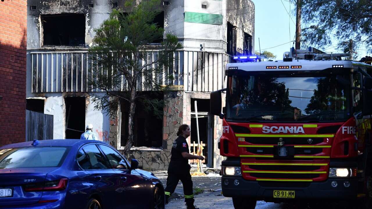 NSW Fire and Rescue officers at the scene of building fire in Newtown, Sydney