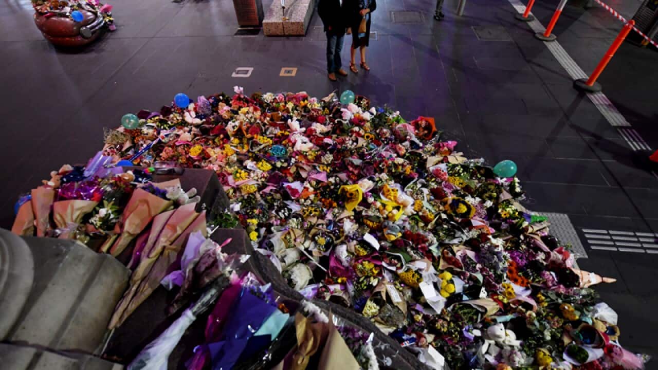 Flowers left in memorial in Bourke St Mall