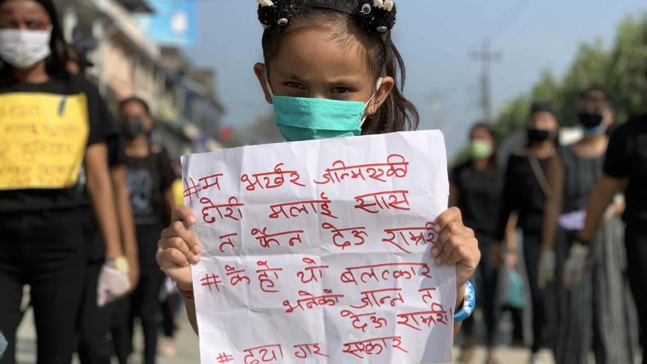 Young girl protesting against rape in nepal.