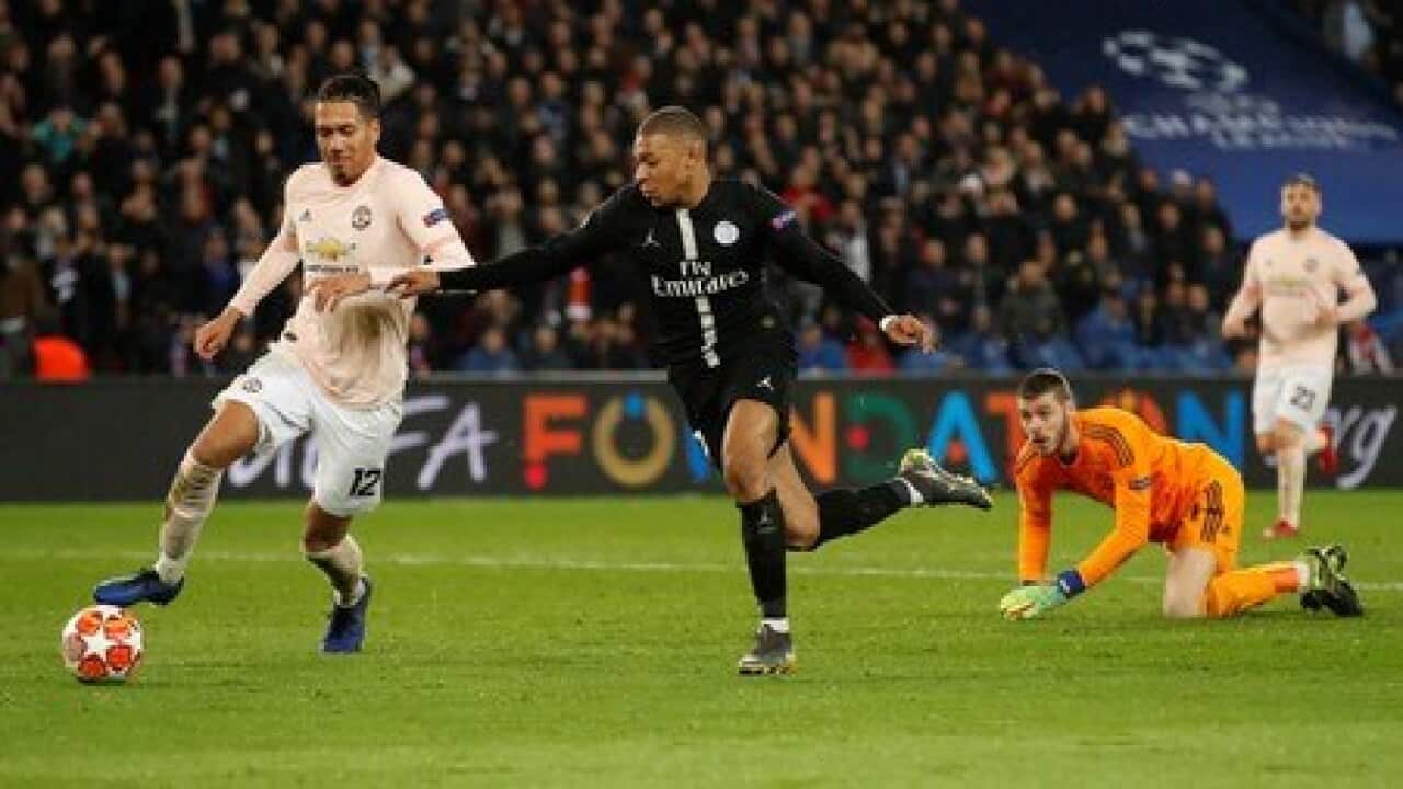 Rashford's last-gasp penalty knocks out stunned PSG