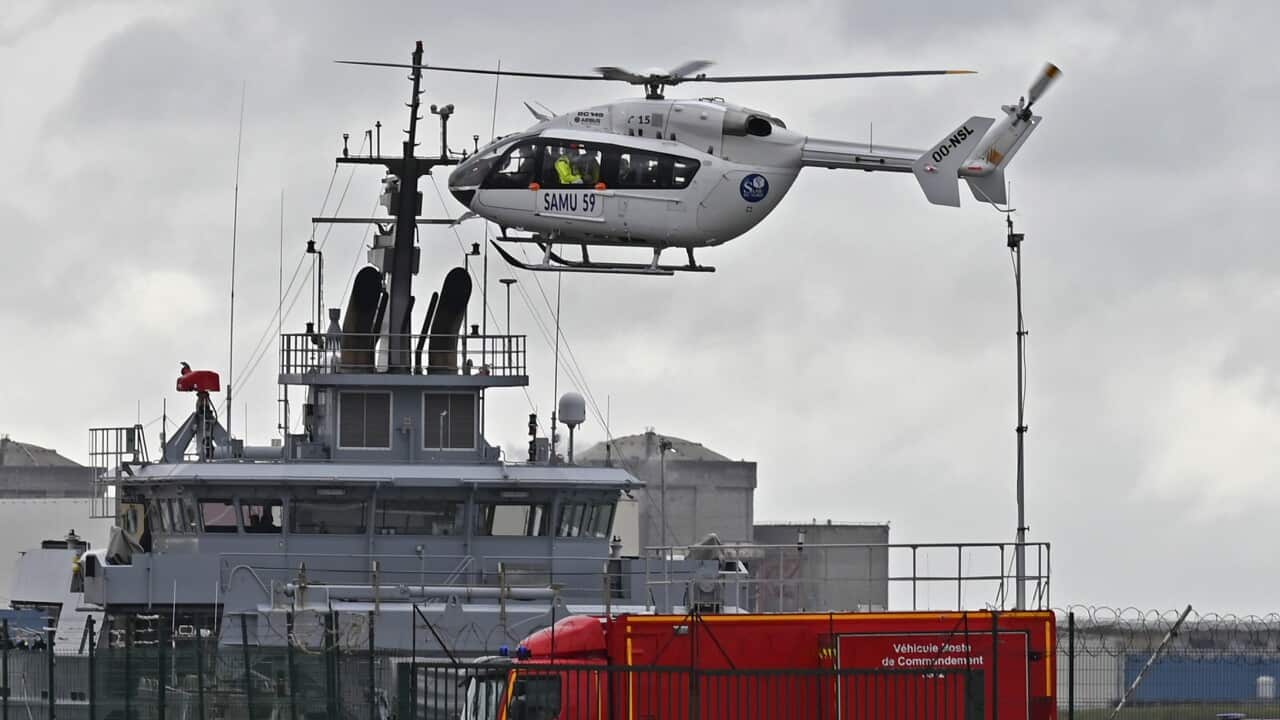 A French rescue helicopter during a search operation for missing migrants, after four people, including a 5-year-old and 8-year-old child died.