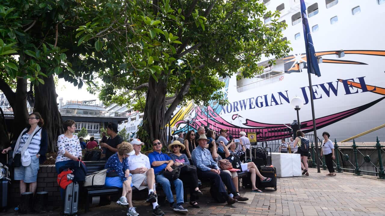 Cruise ship passengers were allowed to disembark after a 45-minute delay.